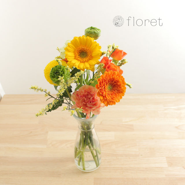 季節の花を入れたご自宅に飾る花（黄色オレンジ）4